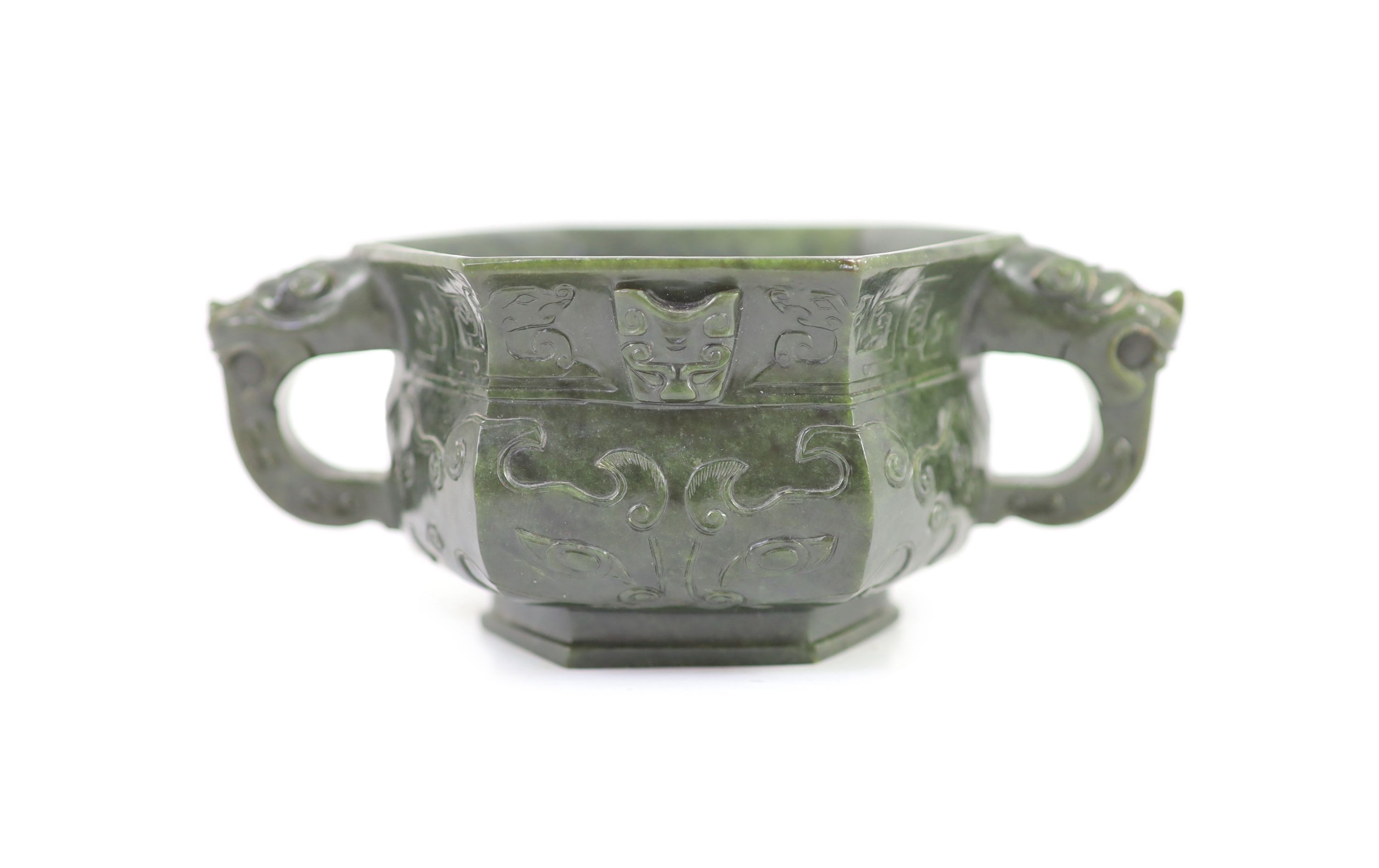 A Chinese archaistic spinach green jade hexagonal censer, 19th century, 17.5cm wide